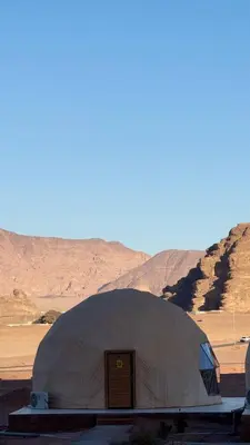 a dome tent in the middle of the desert at Silent Sands in Wadi Rum