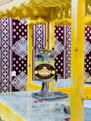 a glass object on a glass table with at DESRT STARS lUXURY CAMP in Disah