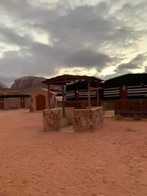a building in the middle of a desert at Hillawi Desert Camp Wadi Rum in Disah