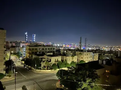 a view of a city at night with at 3 bedroom flat, 3 bathrooms, 7th circle, Amman in Amman