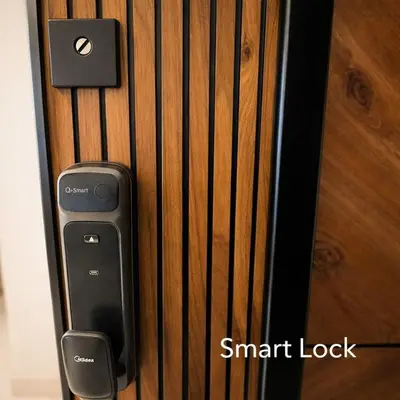 a close up of a smart lock on a door at Abdoun Elite Residence Stunning View in Amman