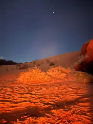 a fire outbreak in the desert at night at Wadi Rum, Mars Cave in Wadi Rum
