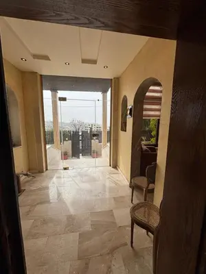 a room with a hallway with a view of a building at فيلا مميزة في عمان - Special Villa in Amman in Amman