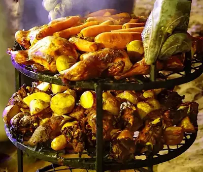 a display of different types of food on three tiers at ULORA Luxury Camp in Wadi Rum