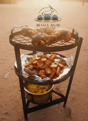 a rack with various types of food on it at MAHA Rum Luxury Camp in Disah