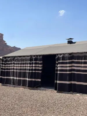 a black and white covering on a building at Red Moon Camp in Wadi Rum