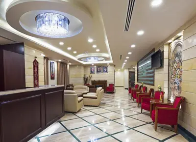 a lobby of a hospital with a waiting room at Olive Hotel Amman in Amman