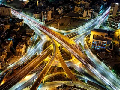 an overhead view of a busy highway at night at Amman Rotana in Amman