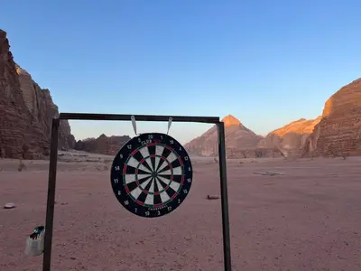 a dart board in the middle of the desert at Wadi Rum Camp in Wadi Rum