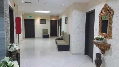 a lobby of a hospital with a waiting room at Al Fakher Hotel Apartments & Suites in Amman