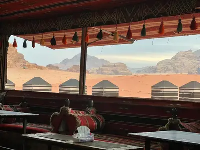 a room with a view of the desert and mountains at Raka Camp & Tours in Wadi Rum