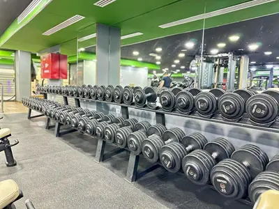 a row of dumbbells on display in a gym at Margarita Hotel in Amman