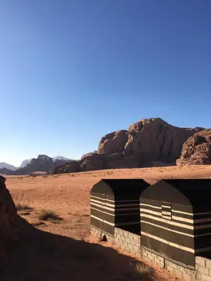a building in the middle of the desert at Wild of Wadi Rum in Wadi Rum