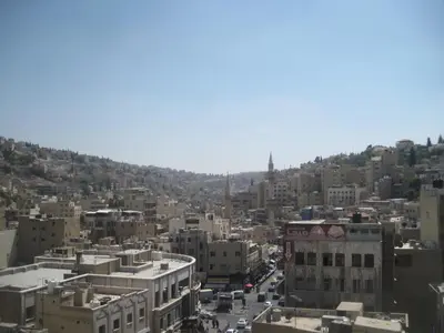 an aerial view of a city with buildings at Arab Tower Hotel in Amman