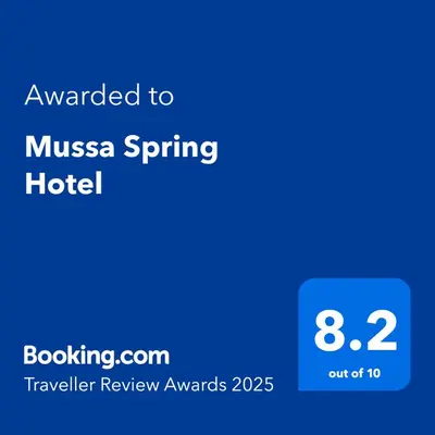 a blue text box with the words awarded to musa spring hotel at Mussa Spring Hotel in Wadi Musa