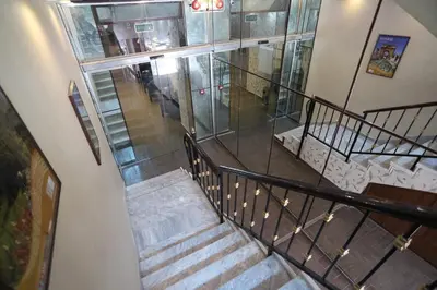 an overhead view of a staircase in a building at 7Boys Hotel in Amman