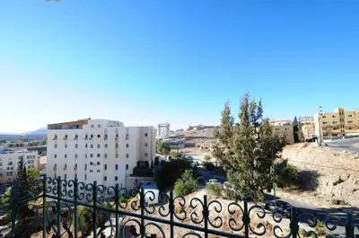 a view of a city from a balcony at Edom Hotel in Wadi Musa