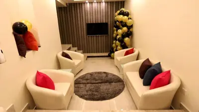 a living room with couches and a carpet at Beirut Hotel 1 in Amman