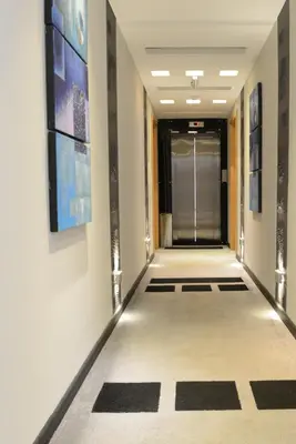 a hallway of a hotel with a hallwayngth at Crystal Hotel in Amman