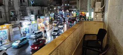 a view of a busy city street with cars at The Boutique Hotel Amman in Amman