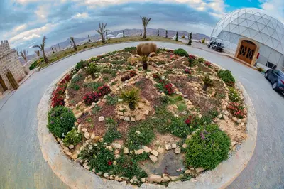 a garden in the middle of a road at Petra Bubble Luxotel in Wadi Musa
