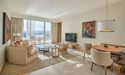 a living room with a couch and a table at Hyatt Regency Aqaba Ayla Resort in Aqaba