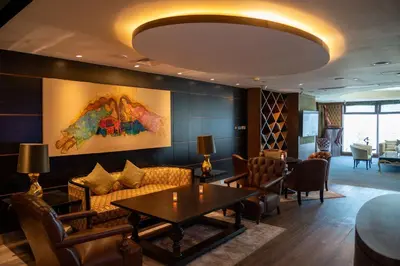 a living room with a couch and a table at Hilton Amman in Amman
