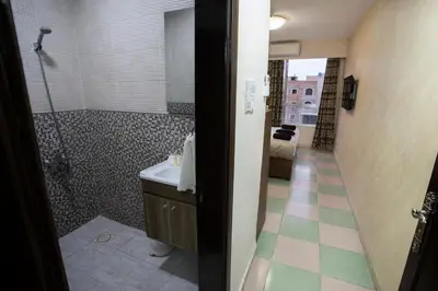 a bathroom with a shower and a sink at Darak hotel in Aqaba
