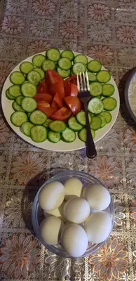 two plates of vegetables and a plate of eggs at Real Bedouin Experience Tours & Camp in Wadi Rum
