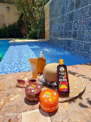 a group of products sitting next to a swimming pool at Orient Villa-Dead Sea in Sowayma