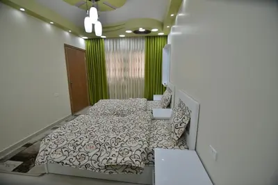 a bedroom with a bed in a room at Juniper House in Wadi Musa