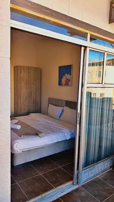 a bedroom with a bed inside of it at Hotel magic aqaba in Aqaba