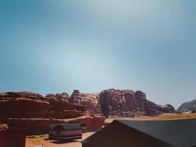 a view of a canyon with red rocks at Wadi rum Local guide camp in Wadi Rum