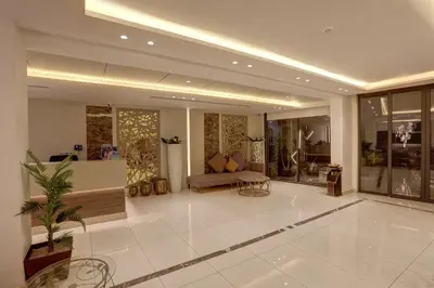 a large living room with a couch and a table at mass paradise2 in Aqaba