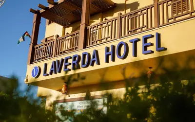a hotel sign on the side of a building at Laverda Hotel in Aqaba