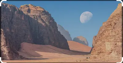 a view of a desert with the moon in the background at Desert shine camp in Wadi Rum
