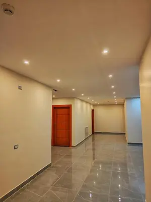 a large empty room with a tile floor at Rakan ApartHotel and Luxury Rooms in Wadi Musa