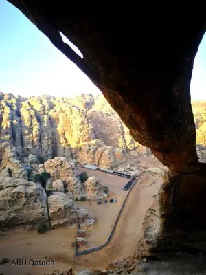 an aerial view of a beach and rocky cliffs at Ammarin Bedouin Camp in Wadi Musa