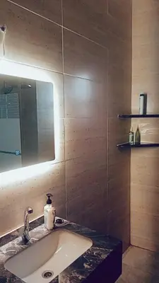 a bathroom with a sink and a mirror at Bubble castle in Kerak