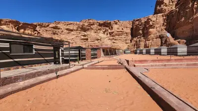 a view of a building in the desert at Real Bedouin life &tour in Wadi Rum