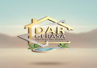 a sign for a car garage with a house at Dar Gerasa chalets - شاليهات دار جراسا in Jerash