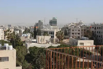 a view of a city with buildings at Post Boutique Hotel Amman in Amman