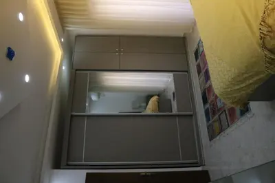 a closet with a mirror in a bathroom at Amazing one Bedroom Apartment in Amman Elwebdah 5 in Amman