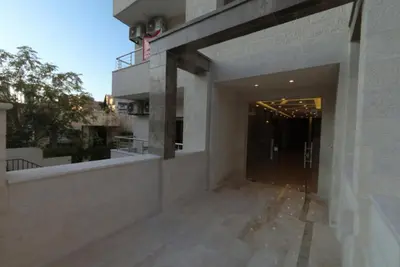 a view of a building from the outside at Amazing one Bedroom Apartment in Amman Elwebdah 1 in Amman