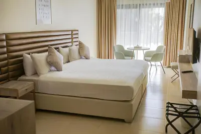 a bedroom with a large bed in a room at Sea view hotel in Aqaba