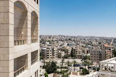 a view of the city from a building at Sheraton Amman Al Nabil Hotel in Amman