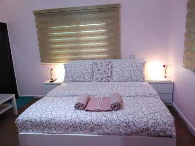 a bedroom with a bed with two towels on it at moon valley site jerash in Jerash