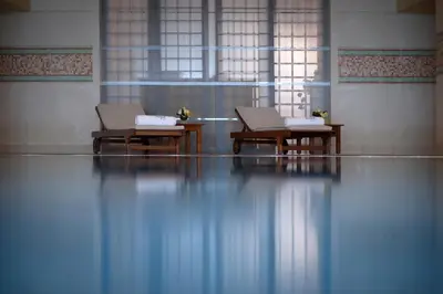 two chairs sitting in a gymnasium with at Le Royal Hotel - Amman in Amman