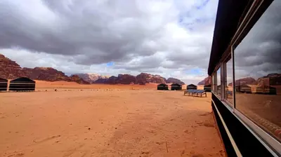 a view of the desert from a bus at joy of life Camp in Wadi Rum