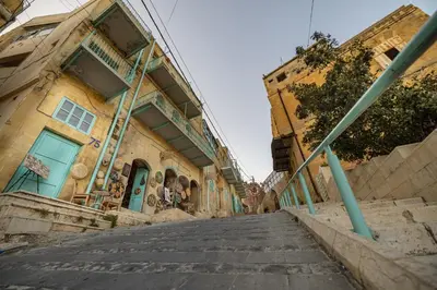 an empty street in front of a building at Jordan Heritage Madhafa in Al Salt